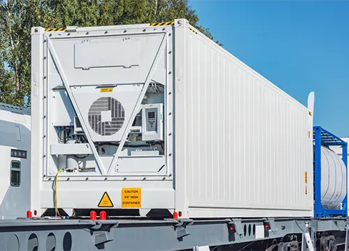 Reefer Shipping 1 Temperature-controlled reefer unit being loaded with perishable goods.